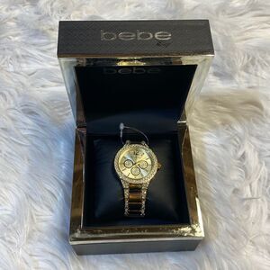 BEBE GOLD AND DIAMOND WATCH